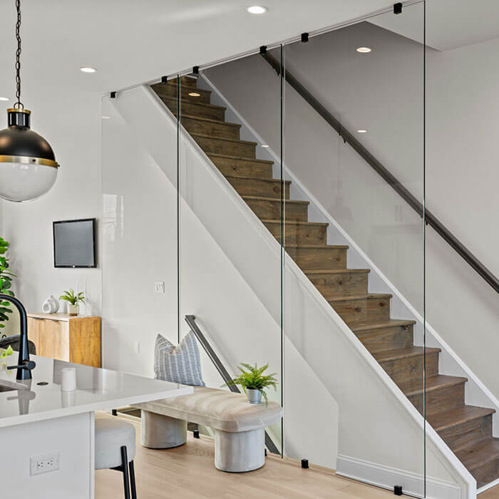 modern townhome with glass partition and oak stairs