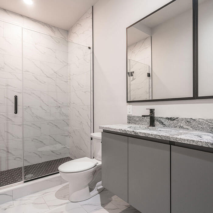 modern bathroom with quartz countertop vanity